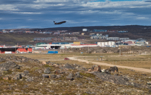 Houses on a rocky hillside beside the Arctic Ocean at Iqaluit