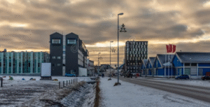 Nuuk city covered in snow in a sunset lights, Greenland