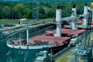 The grain carrier using the other lane of the Gatun Locks is southbound.png